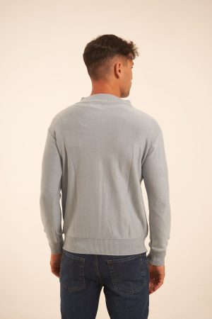 Campera tejida con cierre celeste